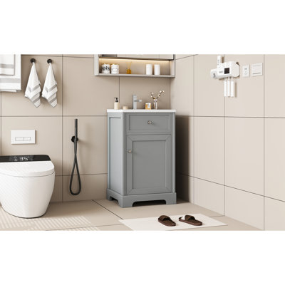 Meuble-lavabo moderne de 50 cm avec lavabo en céramique blanche et tablette de rangement. Vasque de 50 cm, tablette, porte à fermeture douce pour un design fonctionnel.