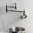 Kingston Brass Fuller Two-Handle 1-Hole Wall Mount Pot Filler Faucet-91118386