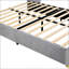 Grand lit plateforme tapissier