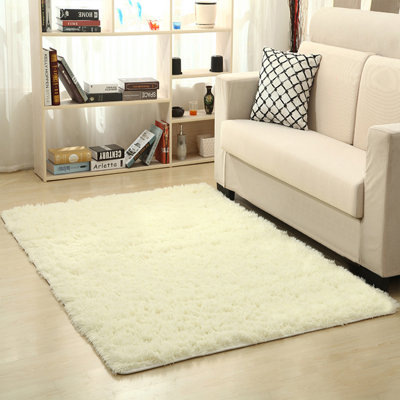 Tapis crème à longs poils Leonela