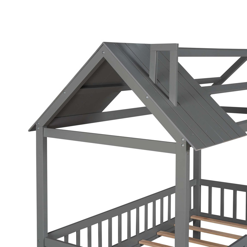 Lit en bois avec clôture