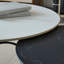 Table basse ronde avec structure en métal pour appartement, décoration intérieure