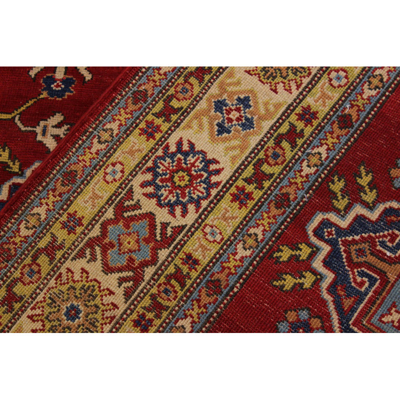 Tapis bleu / jaune / rouge en laine noué à la main de style oriental Madeeha 5 pi 8 po x 7 pi 9 po