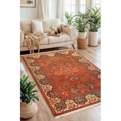 Tapis rouge rouille d'inspiration persane