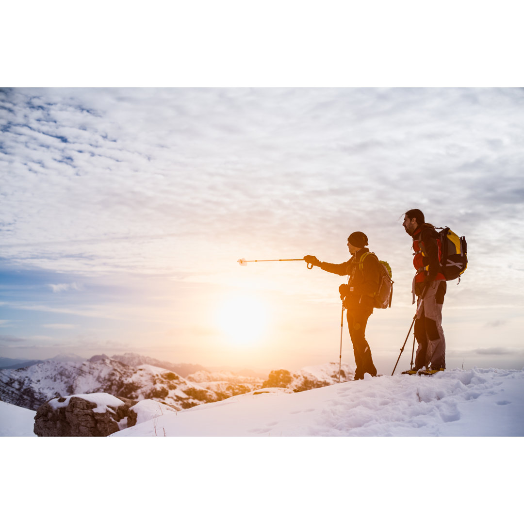 Wanderer oben auf dem Berg