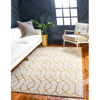 Tapis blanc / doré à motif géométrique Corando
