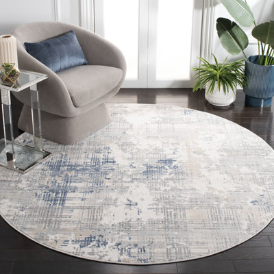 Tapis abstrait en polypropylène tissé à la machine en gris / bleu / ivoire Dudden
