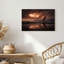 Voilier sous des nuages orange dramatiques sur l'eau, art mural-610176734