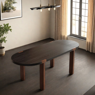 Black Top Brown Legs Solid Wood Oval Dining Table by Latitude Run