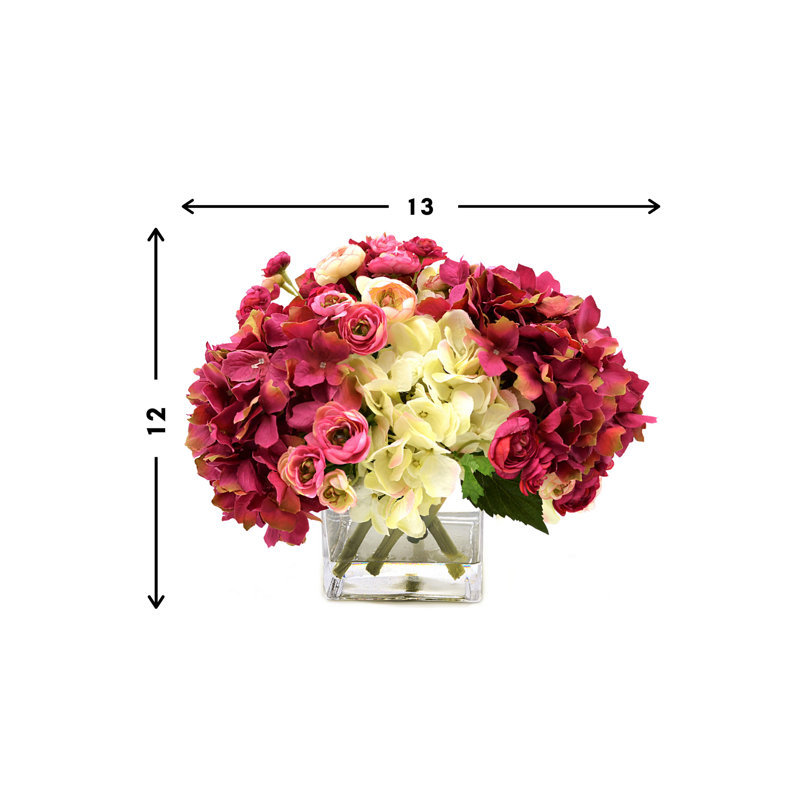 Assorted Hydrangeas And Ranunculus In Square Glass Vase