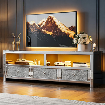 Meuble télé argenté à miroir avec lumière DEL, 3 tiroirs, 2 rangements ouverts et diamants broyés, pour téléviseur de 65 po et plus