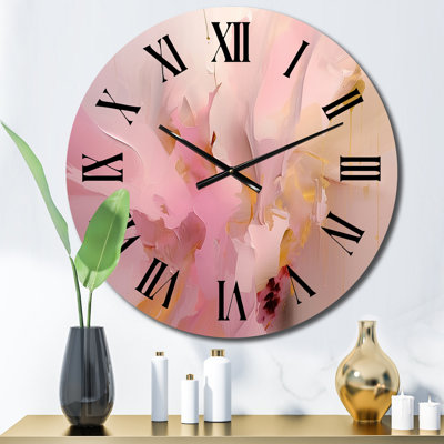 Horloge murale en métal rose