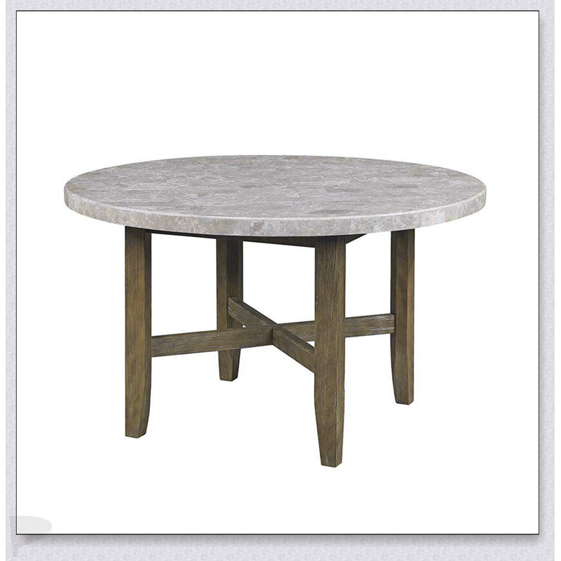 Table de salle à manger ronde en marbre avec base en chêne rustique, alliant élégance et durabilité pour un décor moderne et traditionnel.