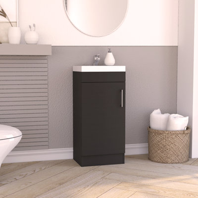 Meuble-lavabo de salle de bain avec poignée en métal et armoire à une porte