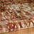 Crittenden Modern Abstract Rust and Blue Area Rug with Short Fringe-26348566