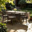 Ensemble repas 7 pièces Boho-Industrial avec table et chaises en rotin | Mobilier de patio 6 places pour terrasses couvertes, osier PE imperméable, assemblage rapide