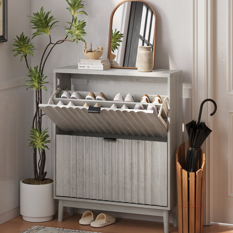 Organisateur de chaussures gris avec portes ondulées pour talons, 2 compartiments, dans le couloir, design moderne, bottes et armoires en matériaux de haute qualité, gris, décor contemporain, espace généreux, rapide