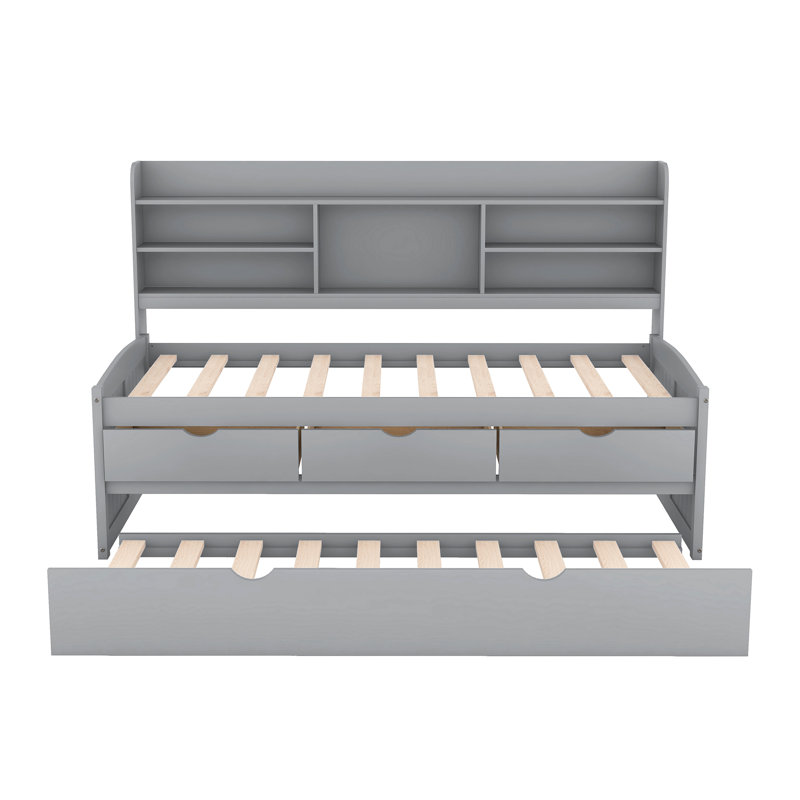 Lit capitaine gris en bois simple avec étagères à livres intégrées, rangement à 3 tiroirs et lit gigogne simple dans des bibliothèques intégrées, grands tiroirs