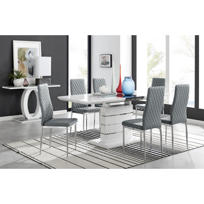 Everson Large High Gloss Extendable Dining Set with 8 Luxury Faux Leather Upholstered Dining Chairs