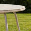 Table de salle à manger ovale en rotin avec plateau en verre