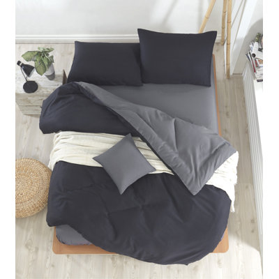 Ensemble de housse de couette double Elegant, noir, avec housse de couette (78,7 x 86,6 po), drap plat (86,6 x 94,5 po), 2 taies d'oreiller (19,7 x 27,6 po) | Doux 65% coton / 35% polyester, lavable à la machine, fermeture à boutons
