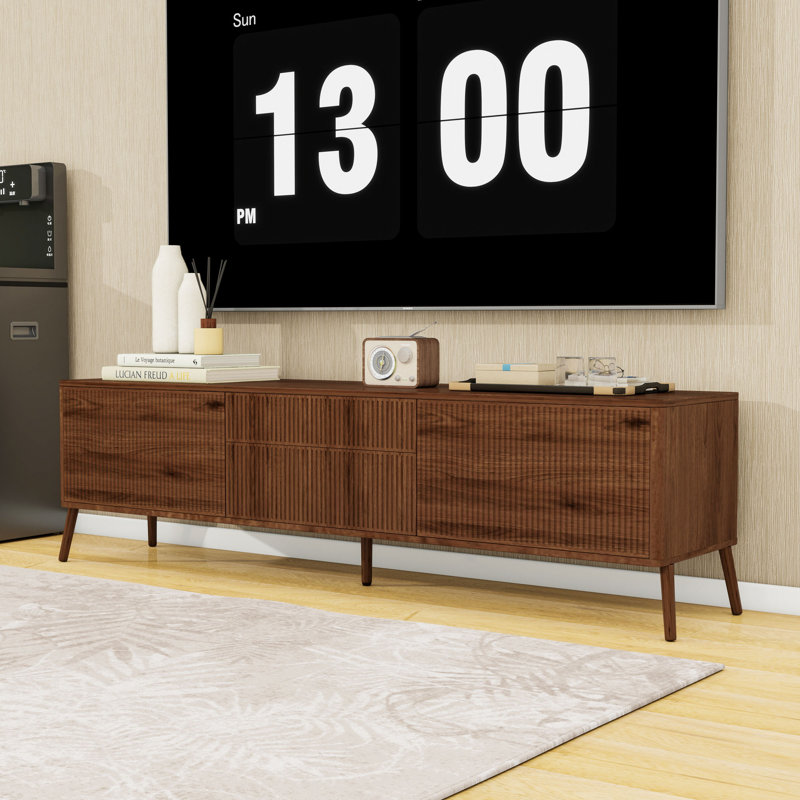 Meuble télé moderne avec tiroirs de rangement, armoires, portes à fermeture douce et trous pour câbles