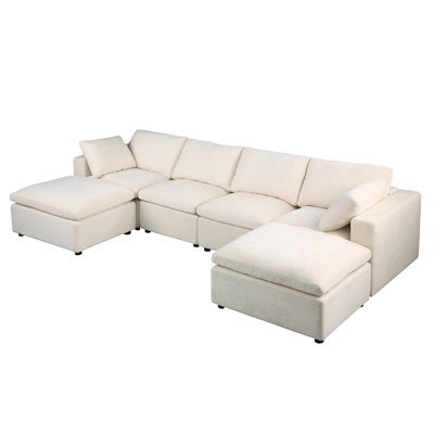 Versatile Modular Sectional Sofa With Ottoman, Offering Comfort And Flexibility For Any Living Space.