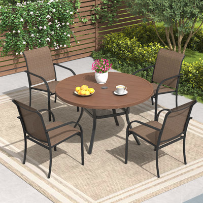 4-Person Round Patio Dining Set with Faux Wood Plastic Dining Table and Stackable Textilene Armrest Chairs by Lark Manor