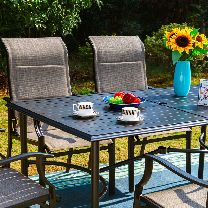 Stoneham 6 - Person Patio Dining Set with Rectangular Table , Cushions Included