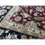 Sona Wool Oriental Area Rug in Red/Navy