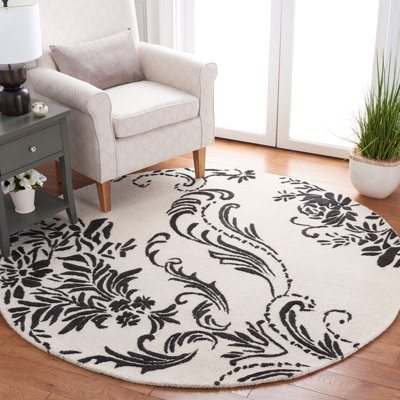 Tapis floral beige / ivoire en laine / coton touffeté à la main Esjay