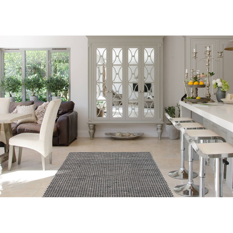 Advika Solid Colour Hand Woven 152cm X 244cm Area Rug