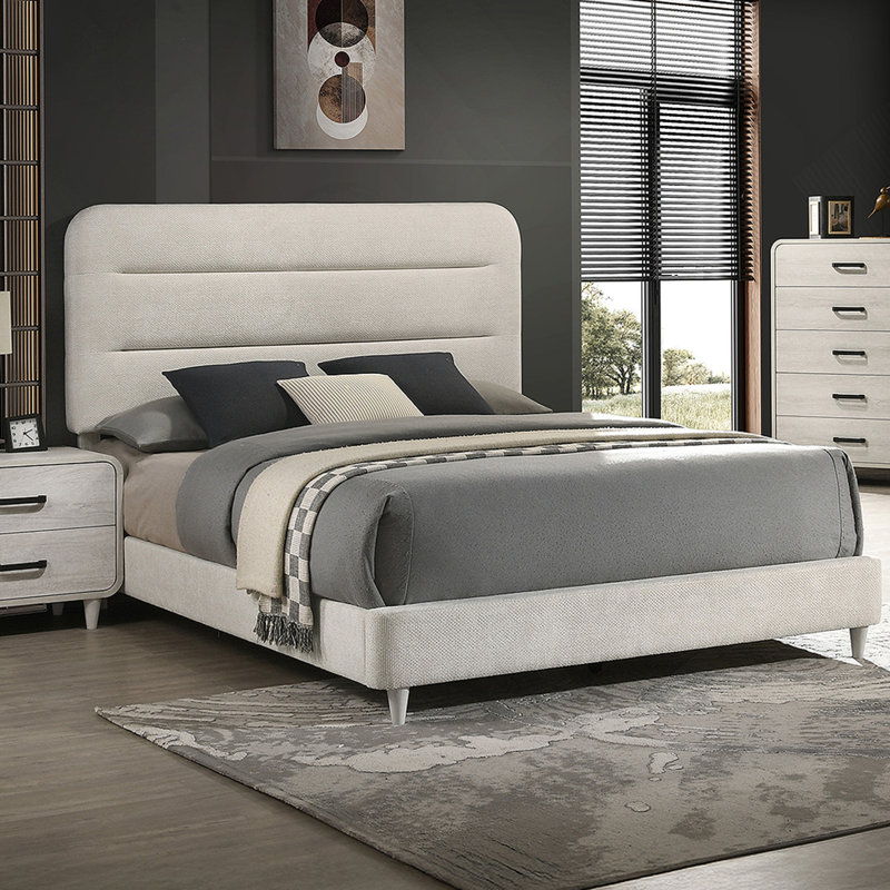 Lit à panneau moelleux rembourré avec des lignes épurées et un design polyvalent, idéal pour créer une chambre à coucher sereine et sophistiquée