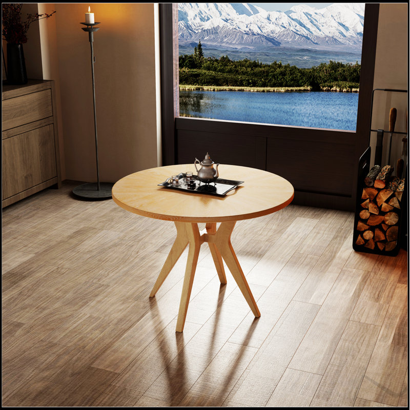 Table de salle à manger ronde Mid-Century moderne avec des pieds en bois qui se croisent, durable et élégante