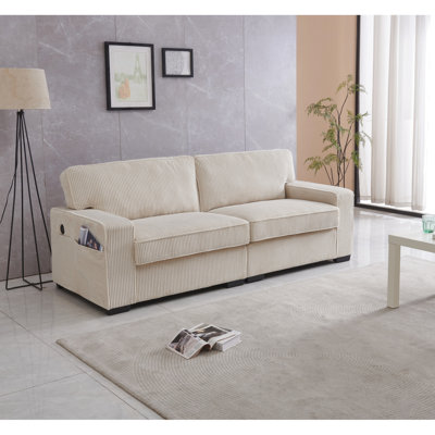 Causeuse en velours crème, structure en bois robuste et coussins confortables avec appuis-tête réglables et ressorts hélicoïdaux revêtus de mousse pour un confort exceptionnel