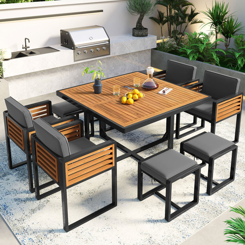 Ensemble de salle à manger de jardin en bois d'acacia de 9 pièces GO, ensemble de patio extérieur peu encombrant, 4 chaises rembourrées et 4 repose-pieds et 1 table carrée, pour la cour, le jardin, la terrasse et le bord de la piscine, gris