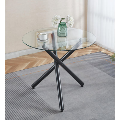 Table de salle à manger ronde avec pieds en métal noir et table de cuisine moderne et compacte pour le salon