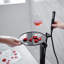 Robinet de baignoire autoportant à poignée simple à pattes avec douche à main et plateau de rangement-103530663