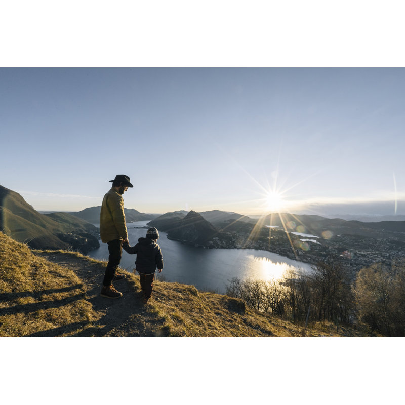 Father and Son Pause at Edge of Trail by Ascentxmedia, 20" H x 30" W
