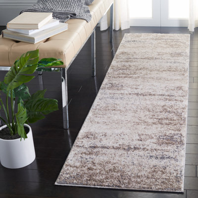 Tapis abstrait ivoire / gris