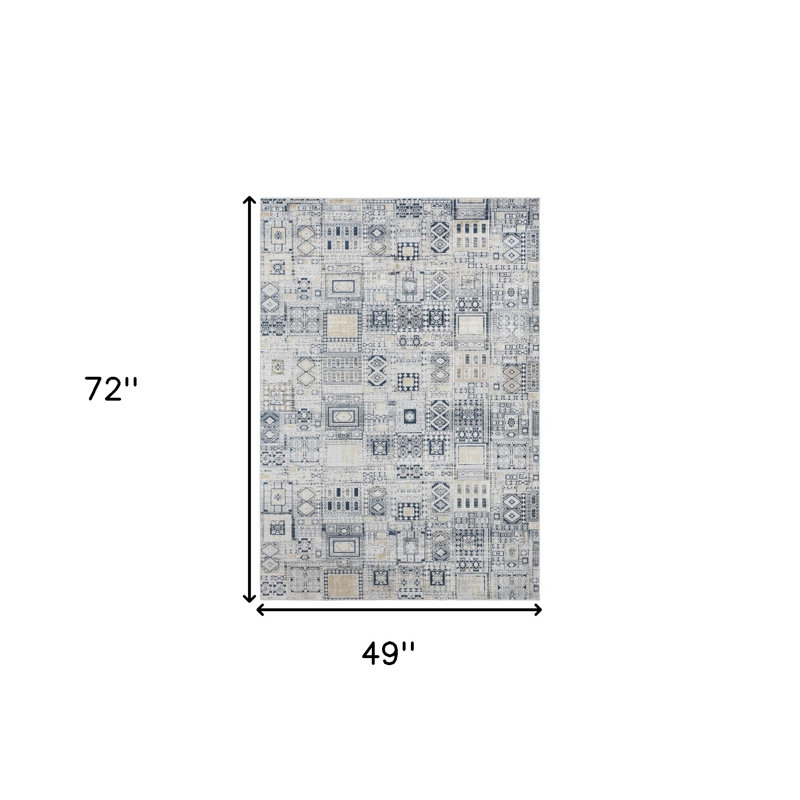 Tapis ivoire noir et doré 4 pi x 6 pi ivoire