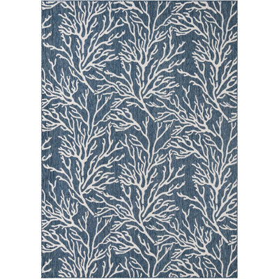Tapis bleu contemporain Azilynn