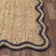 Ayanne Hand-Braided Scalloped Jute Navy Indoor Area Rug with Non-skid Backing