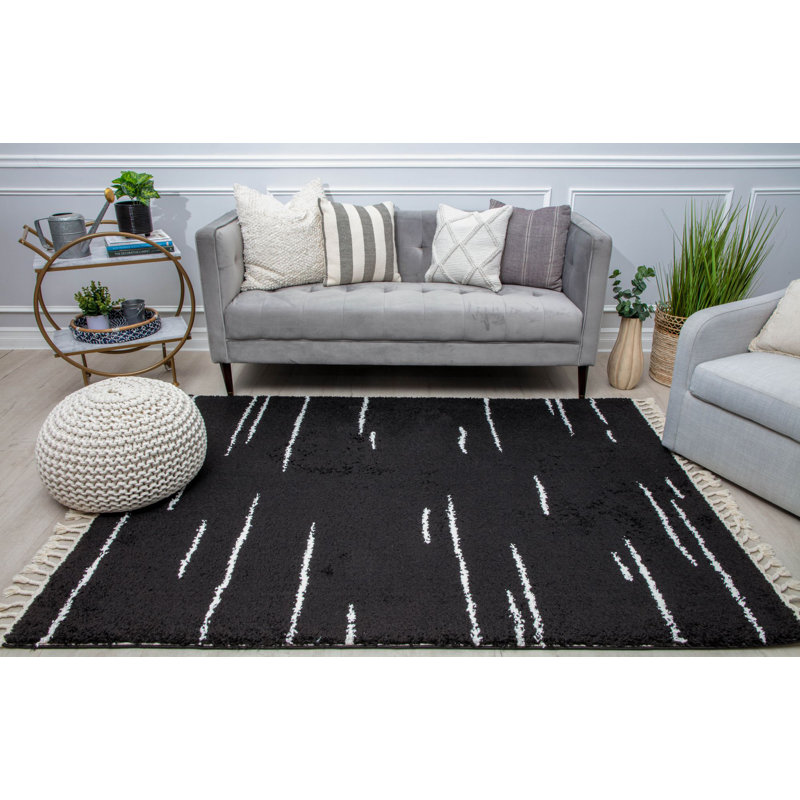Introspective Black Abstract Shag Synthetic Area Rug with Braided Tassels