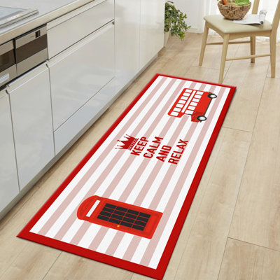 Tapis rayé en jute tissé à la machine en rouge / rose / blanc