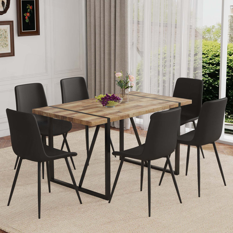 Une table de salle à manger rectangulaire rétro minimaliste avec un dessus spécialement texturé et des pieds en métal, jumelés à 6 chaises