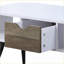 Table basse moderne blanche et noire avec tiroir, rangement peu encombrant pour le salon