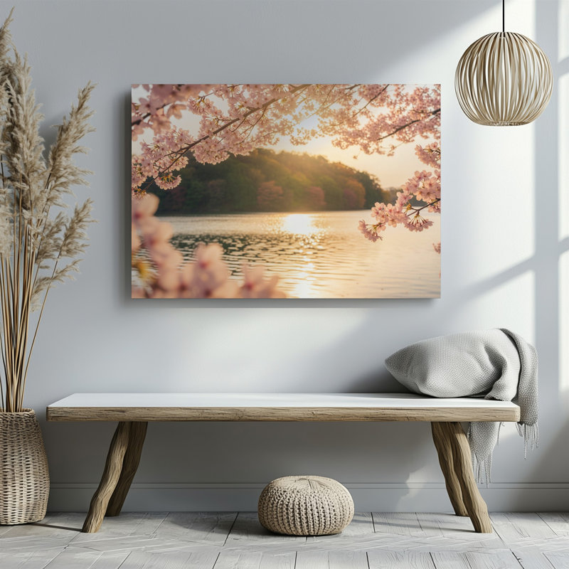 Toile, scène sereine de printemps mettant en vedette des fleurs de cerisier roses délicates encadrant le dessus et les côtés de l'image avec leur toile tendue