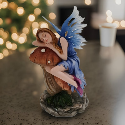 6.25"H Blue Fairy Sleeping with Mushroom Figurine