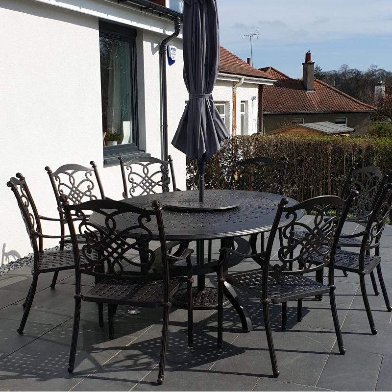 Canouan 8 - Person Patio Dining Set with Oval Table , Cushions Included